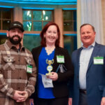 Kim Stevenson receiving her award