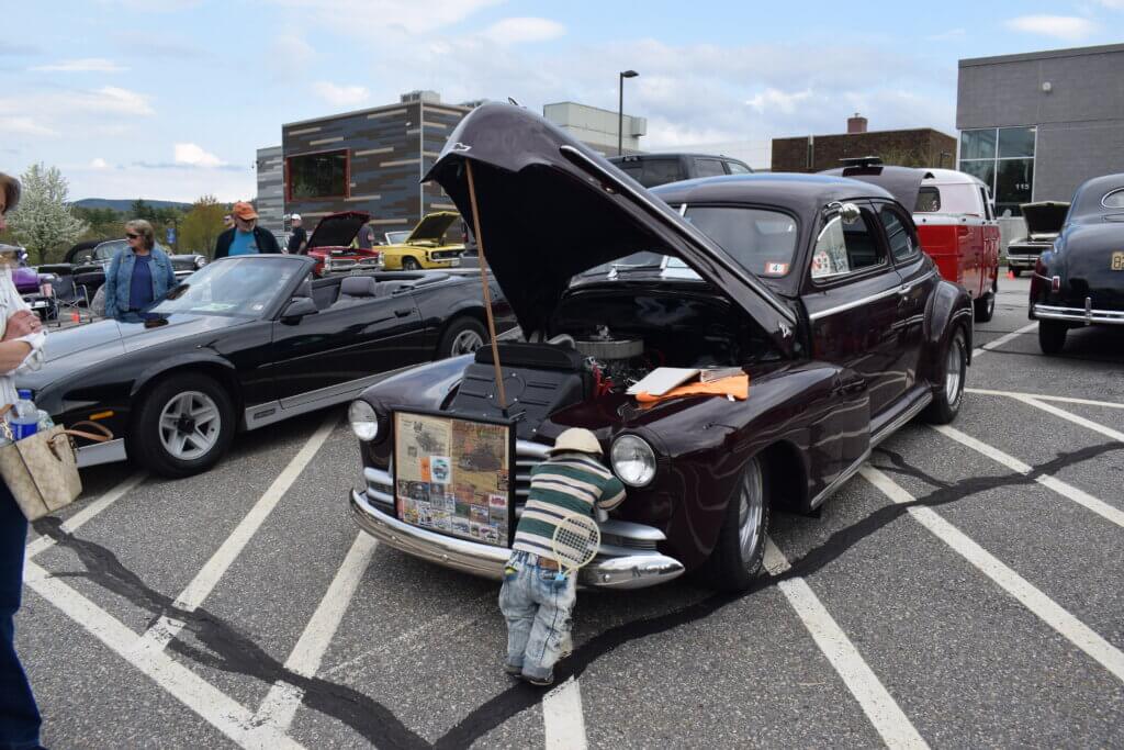 Classic car with hood open
