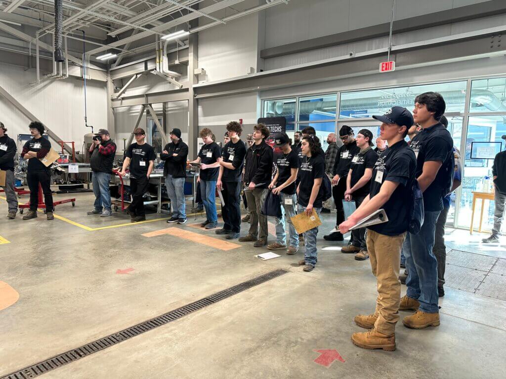 Students competing in SkillsUSA listening to instructions
