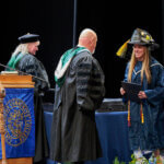 Fire Science Graduate receiving diploma 2026
