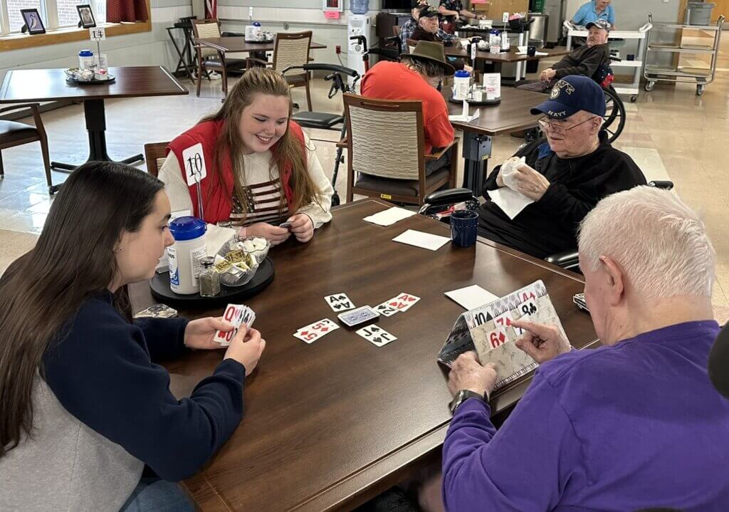 PTK students playing cards at NH Veterans Home